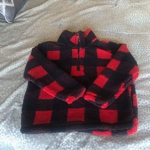 Red and black checkered pullover